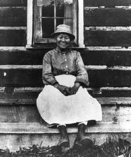  Polly outside her cabin 